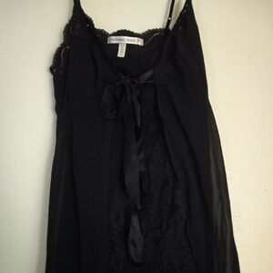 Used,not new black chemise nightgown by Victoria Secret.  Black  lace front.